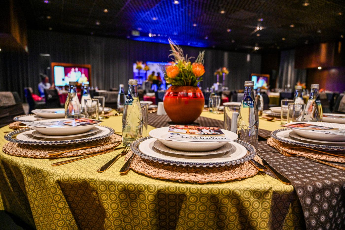 A photograph of a nicely set table at an event.